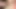 Onu dildoyla sikiyorum ve kendine şaplak atıyor