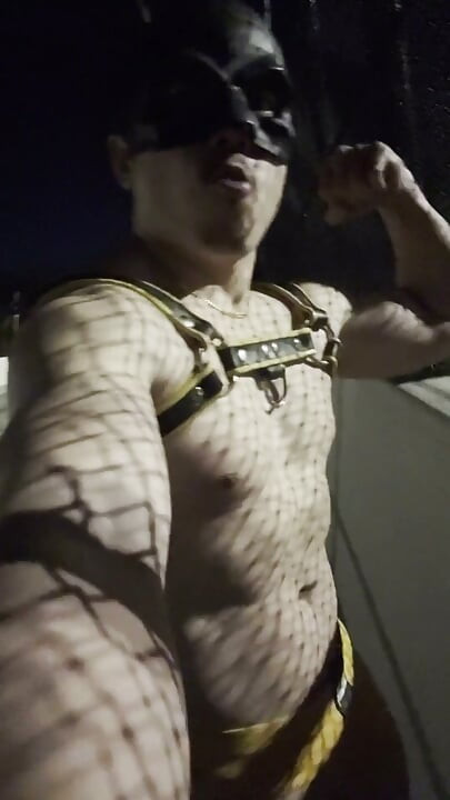 Midnight Muscle Tease: Asian Hunk Flexes Ass & Biceps in Yellow Harness on Highway Bridge