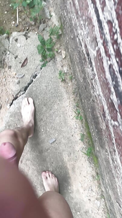 A young man publicly displays his erect penis.