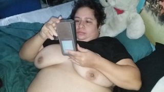 Chubby melissa looks at her porn and orgasms