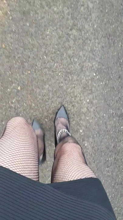 Walking in Black ankle strap shoes, fishnets and skirt (POV)