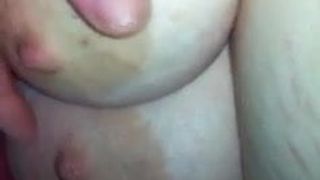 Playing with wifes tits while she