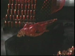 Fetish slut gets covered in hot wax