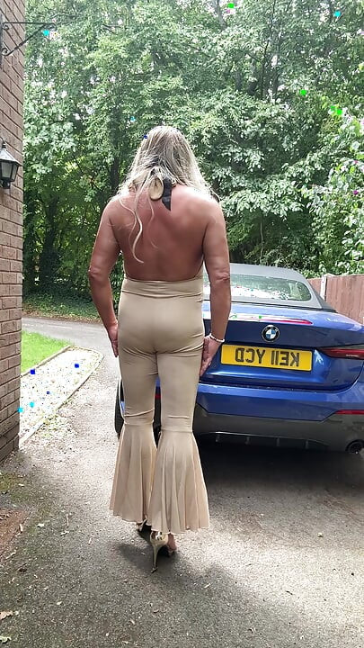 Sexy Crossdresser kellycd2022 in gold stretchy catsuit and heels