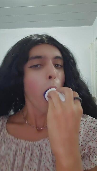 Petite trans girl sucks on deodorant