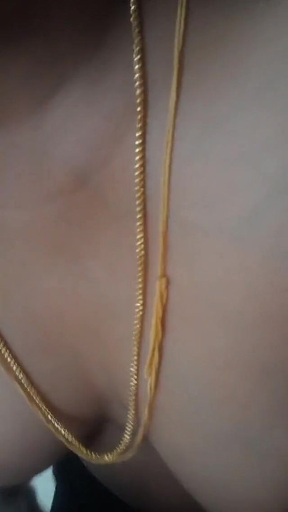 Key moment from "Swetha Tamil desi wife nibbles clamp and pussy masturbation part 2"