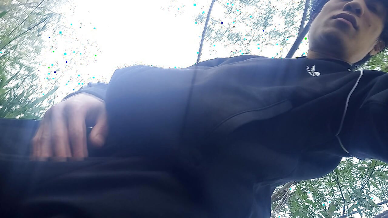 Gay boy Jon Arteen, wearing adidas tracksuit Campus sneakers, gets a hard-on outdoors, jerks off, squirts big cumshots before cl