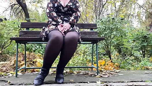 Mature stepmother undresses outdoors