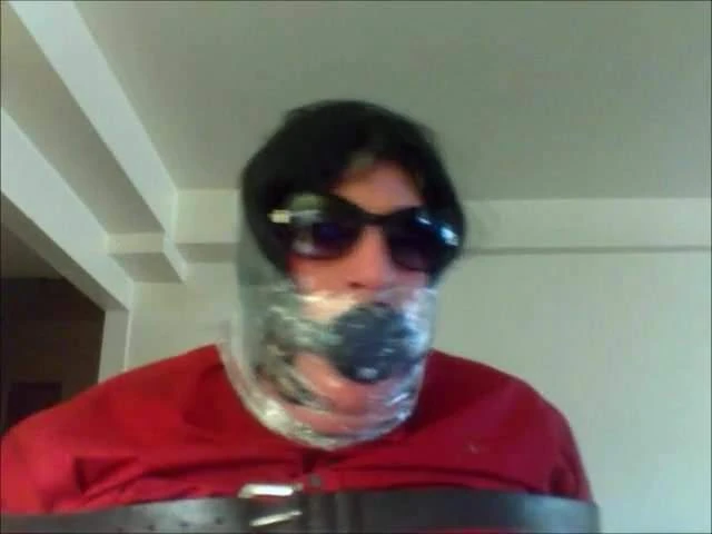 Sissy Stephanie struggling while gagged and saranwrapped