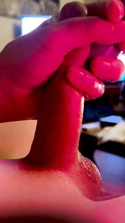 Autofellatio fantasy. Cock gets hard with vibrator watching porn.