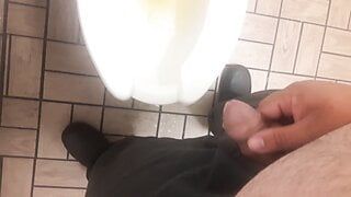 Peeing and then stroking it a little before going back to work