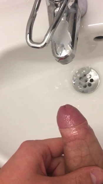 Cumshot in public toilet