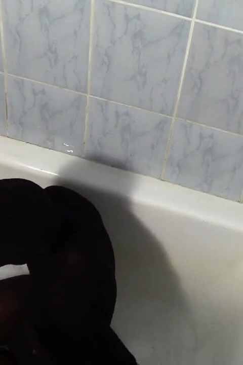 Sexy Louise, totally encased in pantyhose getting a bath