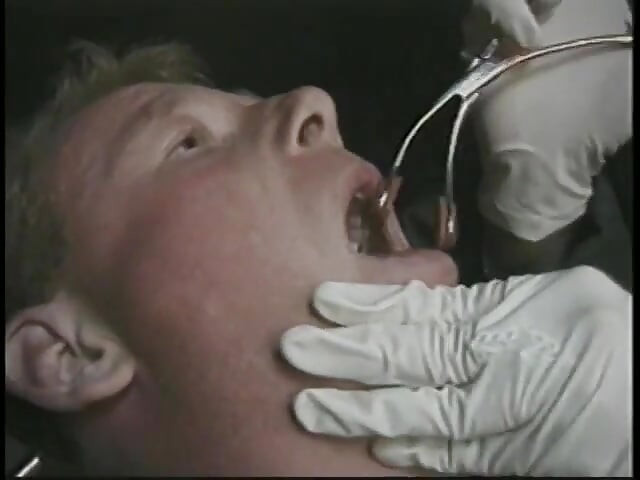 Bound man is subdued with strange penis remedy by two chicks in dungeon