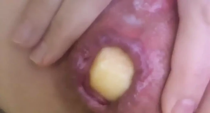 Anal insertion with a cute apple