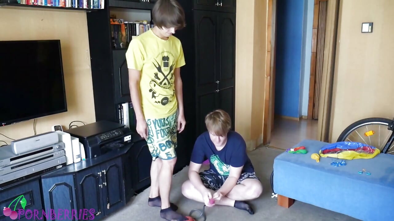 Thin, black socks blowing up balloons + footjob