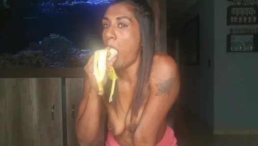 Topless desi squeezes her boobs as she sucks and deepthroats on a banana