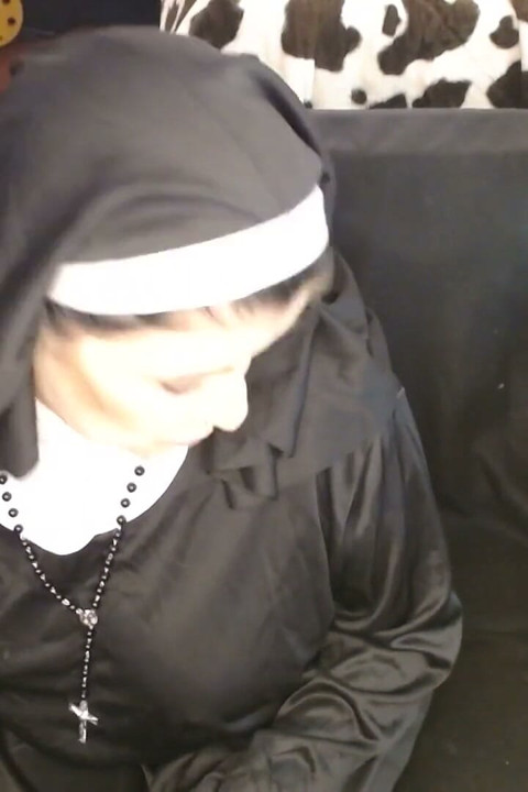 Nun Smoking Ashing in Her Bible Virginia Slims 120