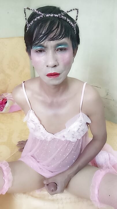 Oanh Le transgender wearing a sexy robe masturbating happily