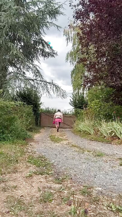 Dressed in a pink plaid mini skirt for a night out