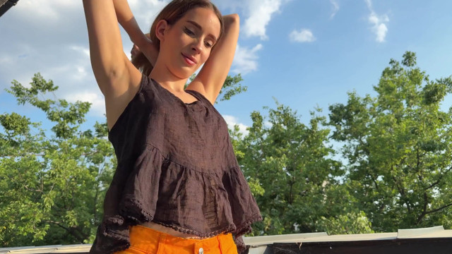 Incredibly hot and beautiful skinny college girl under the shining sun outdoors shows what is under her short skirt