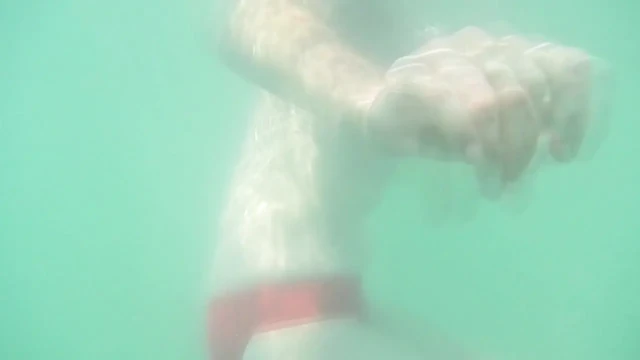 My tits underwater on public beach