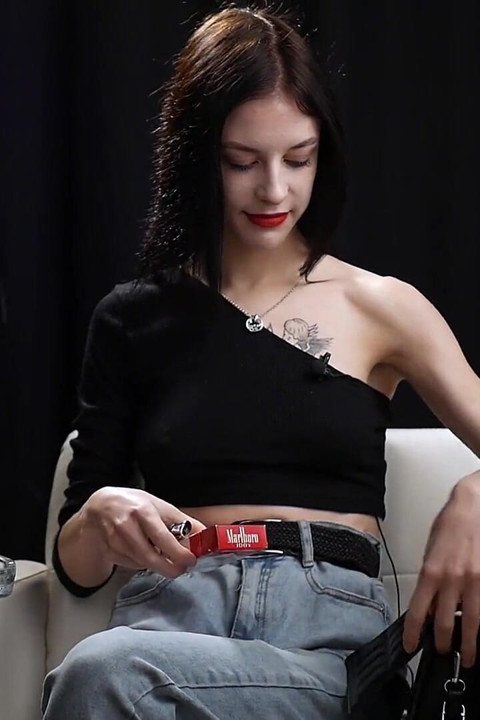 Slim Chick Is Smoking Two Reds