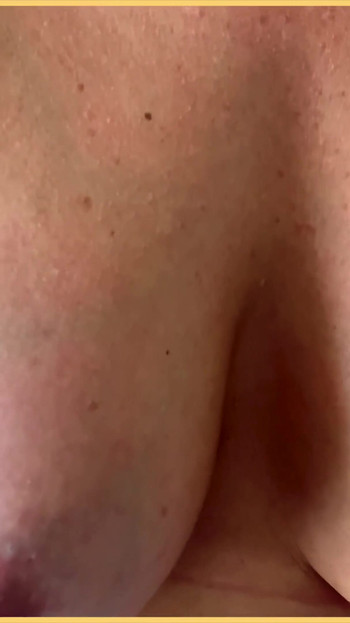 Key moment from "Wifeys big perfect tits getting vibrated and bounced in slow motion"