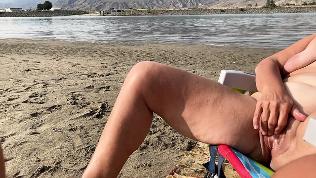 Masturbating on the beach