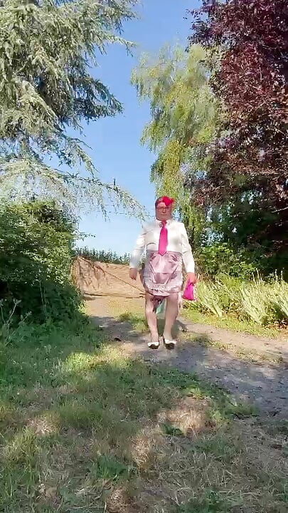 In little maid outfit with a short fuchsia skirt for a day