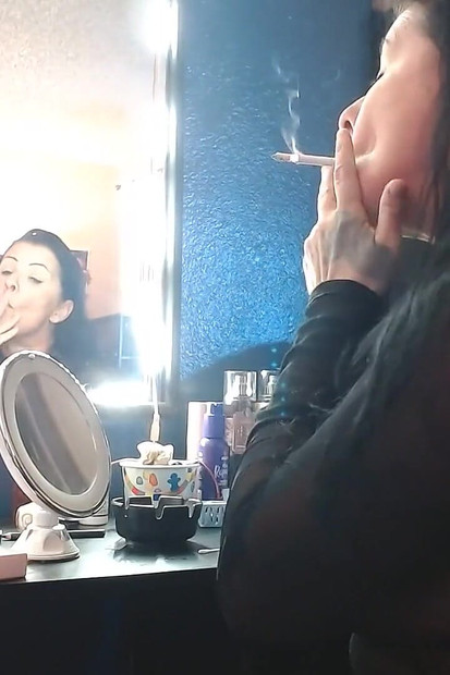 Dangling Long Virginia Slims 120 Cigarette