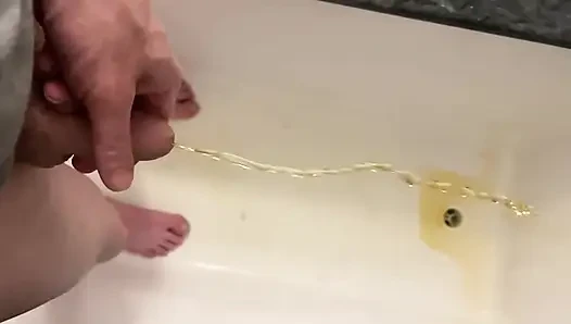 Amateur Boy Pissing, with Close-up and Good Quality Slow Motion of the Load of Pee Coming Out of the Pee-hole (urethra)