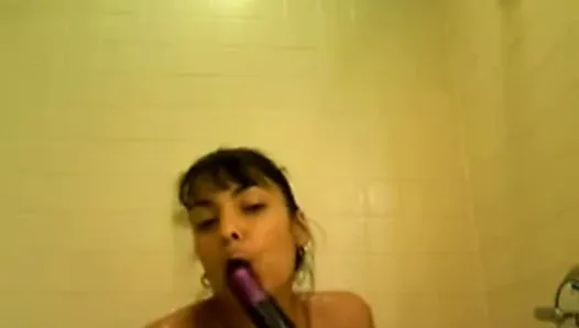 Big boobs latin girl martubating in the shower with dildo