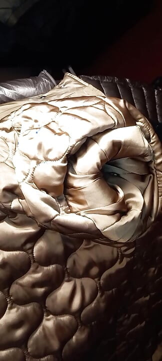 Ejaculating my cum twice on the lining of a long shiny lady coat