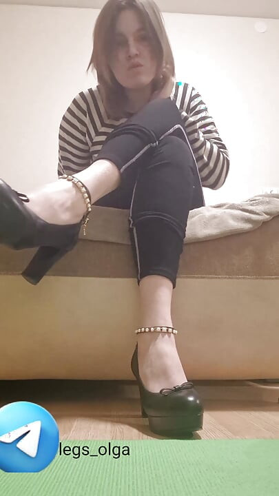The girl makes you lick your feet and shoes. Sweet femdom