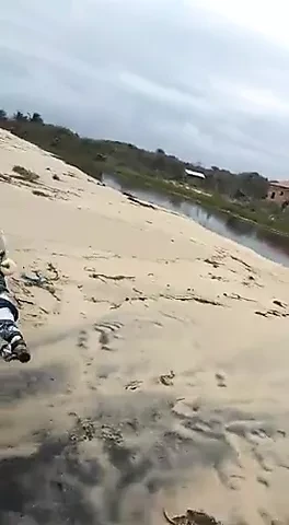 Two bitches fuck on the beach with a stranger