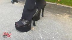 Lady L sexy walking with extreme black mules.