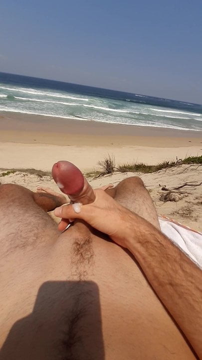 Beach jerk with cum.