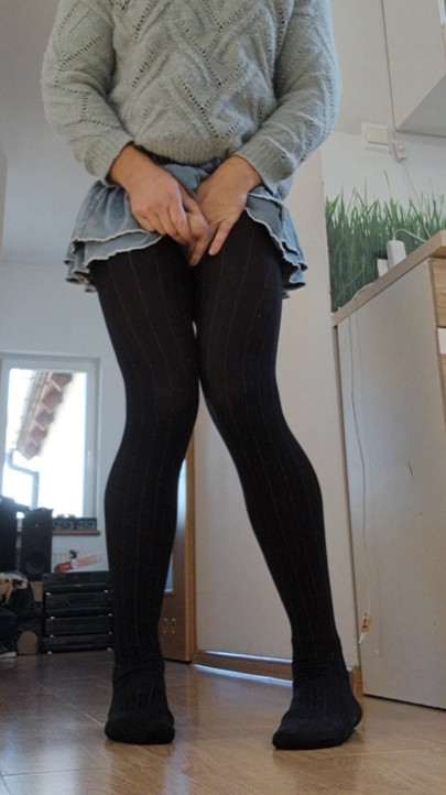 In sweet pantyhose and sweter