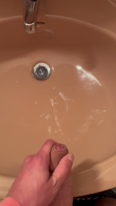 Fat cock squirts in the sink