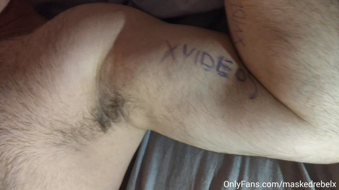 Man with big biceps masturbates his fat cock