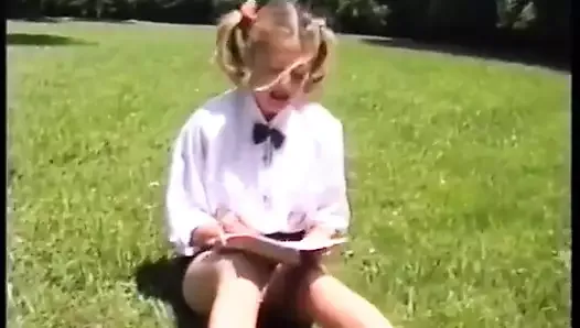 A college girl with blond duvets gets fucked on the lawn.