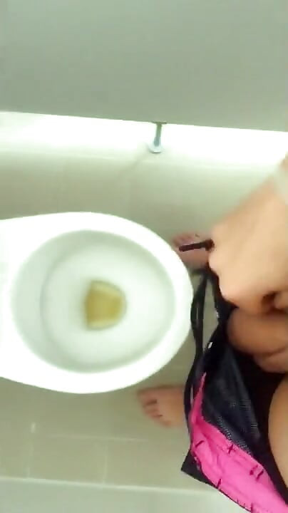 Tattooed Twink Is Pissing in Waterpark Piss Filled Toilet