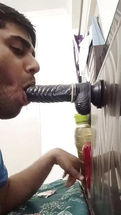 Gay bottom huge dildo sucking