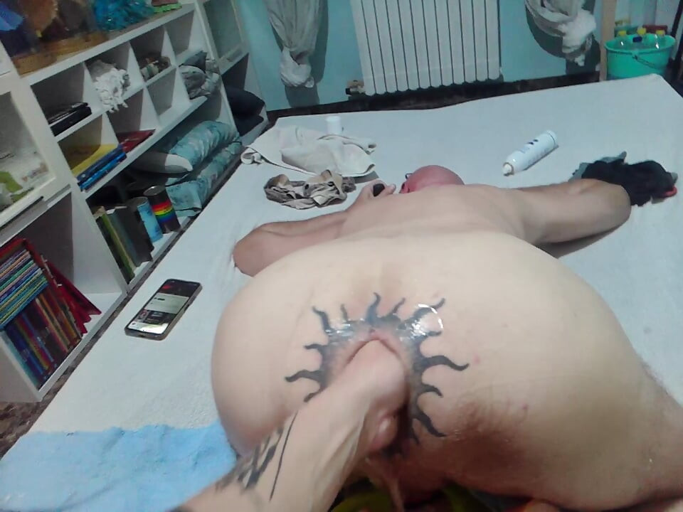 Tattooed ass getting fist
