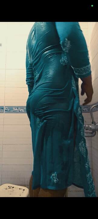 Hottest bath in transperent dress and black bikini