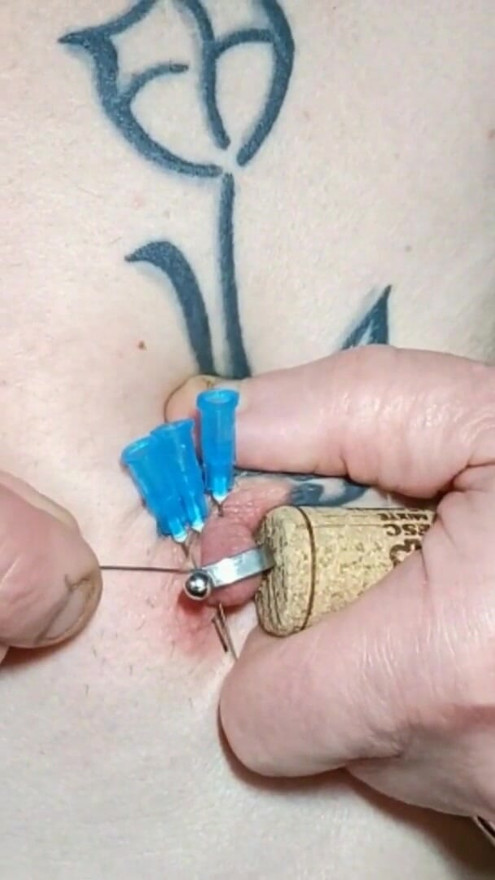 4 needles in tit tattoo | Clip 1
