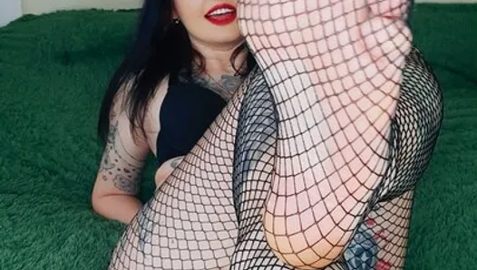 Foot fetish from sexy mistress. Dominatrix Nika in fishnet tights seduces you with her feet and toes. Yes! Kiss and lick
