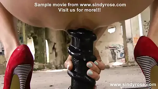 Sindy Rose fuck her ass with a screw dildo in ruined factory