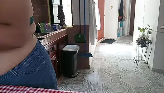 Mom in the kitchen in bralett